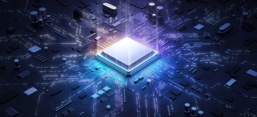 Blue and pink chip in a circuit board