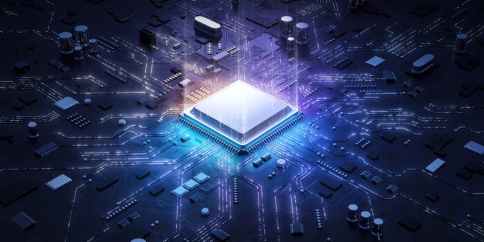 Blue and pink chip in a circuit board