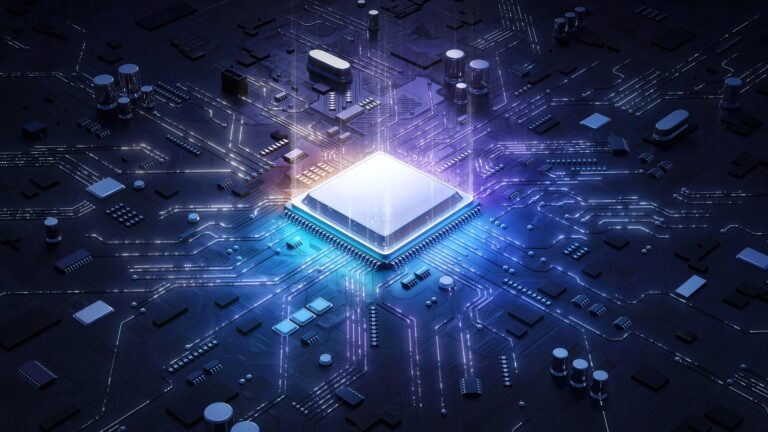 Blue and pink chip in a circuit board