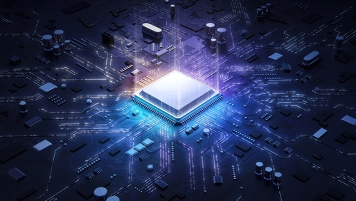 Blue and pink chip in a circuit board